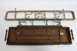 A collection of items to include two Edwardian folding coat rack hooks,
