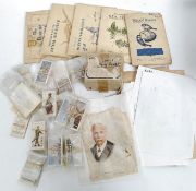 Box of cigarette and tea cards.