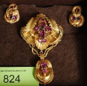 A Victorian 15ct gold and amethyst stone set ladies pendant and necklace set.