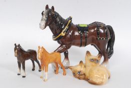 A Beswick cat group along with two Beswick fowls all stamped with a Leonardo Shire Horse