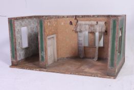 An antique 19th century German made dolls house room.