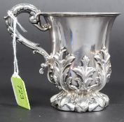 An antique silver hallmarked art nouveau tankard.