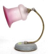 A vintage mid 20th century bankers style anglepoise desk lamp with metal base,