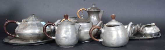 A collection of Pewter (mostly ' English Pewter ' ) to include jugs, cups etc.