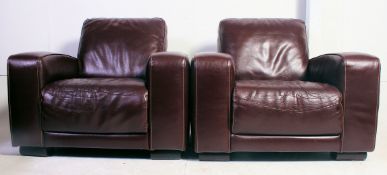 A  pair of Art Deco style leather club armchairs.