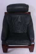 A vintage Danish leather and bentwood cantilever armchair having rosewood effect frame with green