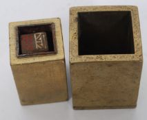 A Chinese brass cased highly engineered containing a dice form seal