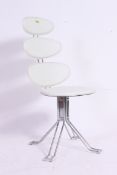 A fabulous contemporary late 20th century Italian chrome and white leather swivel chair.