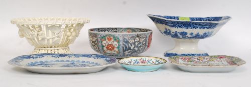 A collection of Chinese ceramics to include a blue and white raised tureen along with a Chinese
