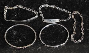 Two 925 white metal / silver bangles bracelets, a 925 bracelet with purple stones,