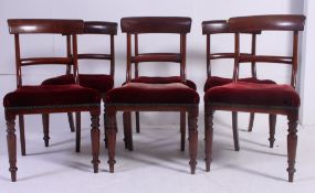 A set 6 Regency mahogany bar back dining chairs raised on turned legs with overstuffed red velour