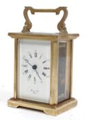 A good Bornand Freres brass carriage Clock  complete in the red leather travel case.
