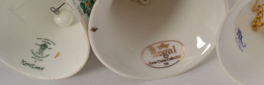 A collection of ceramic bells to include examples by Coalport, Paragon, Regal,