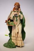 A ceramic figure of a maiden entitled 'The Rose Of Tralee' by Anne O'Conner.