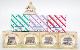 A collection of Leonardo cottages along with betterware cottage figurines to include.