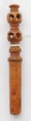 A 19th century treen apple corer.