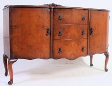 A 1950's Queen Anne revival burr walnut sideboard dresser.