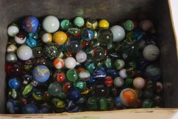 A collection of assorted vintage glass marbles