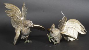 A pair of larger-than-usual white metal fighting cocks 28cm long
