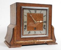 A good quality 1930s oak cased eight day mantel clock,