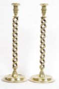 A pair of very tall antique open twist brass candlesticks. 16in tall.