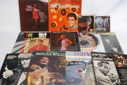 A collection of vinyl lp's to include The Beatles, Petula Clark, Elvis and other artists,