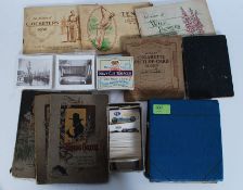 A collection of assorted vintage cigarette cards, tea cards etc. Some in albums, others loose.