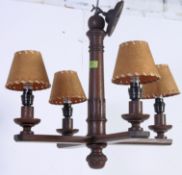 An Ercol style oak sideboard, two short draws above lower twin door cupboard sections.