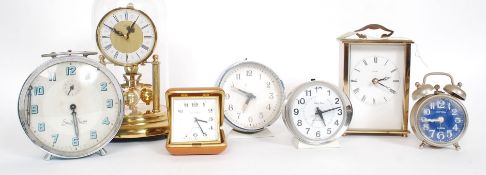 A collection of seven retro and vintage clocks to include Baby Ben,