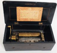 A late 19th Century rosewood marquetry inlaid music box.