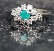 A white gold and emerald with diamond ladies cluster ring M/N