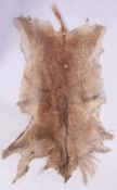 A retro vintage 1970's taxidermy deer skin - hide floor rug ( see illustrations ).