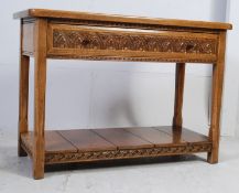 A solid oak Arts & Crafts console table made by John Chapel of Clevedon.