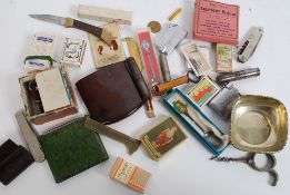 A collection of vintage pen knives, lighters, corkscrews,
