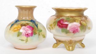 Two early 20th century Royal Worcester porcelain vases, the first circa 1918,