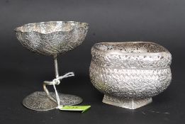 Two 20th century Indian white metal (tested as silver ) bowls - the first in naturalistic form with