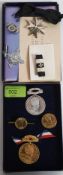 A collection of medals to include Edward VII Coronation Hospital fund metals and brooches together
