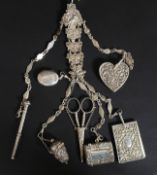 A Victorian chatelaine clasp of impressive large form adorned with 5 linked panels with cherub