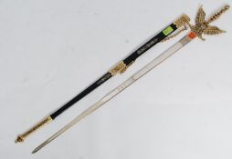 A good quality decorative sword with eagle handle by Robert of Spain having steel blade with