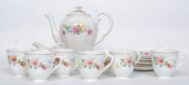 A Tuscan china vintage chintz pattern part tea service comprising cups, saucers, plates,