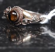 A 22ct gold and silver tigers eye vintage ladies dress ring. Weight 1.