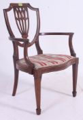 An Edwardian mahogany hepplewhite revival bedroom chair.