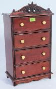 An apprentice piece Victorian style mahogany tallboy chest of drawers having finial knob handles to