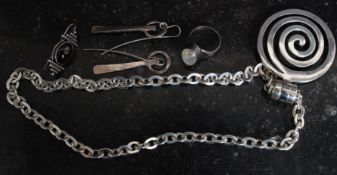 A heavy silver contemporary ladies necklace and pendant together with earrings,