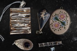 A collection  of silver 925 - sterling necklace pendants to include Siam silver, flower,