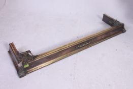 A good quality early 20th century copper and brass fire fender kerb.