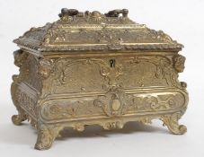 A very good 20th century heavy silver plated brass casket of rococo form with hinged top and baize