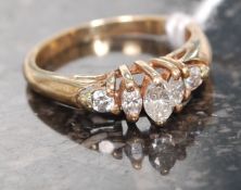A ladies 14ct gold 5 stone diamond ring.