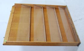 A good 1950's retro school / Industrial wall mounted stationary pocket shelf.