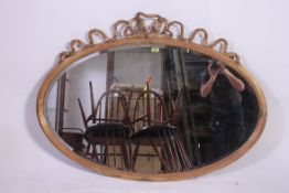 A late Victorian / Edwardian overmantel mirror in the Adams revival style.